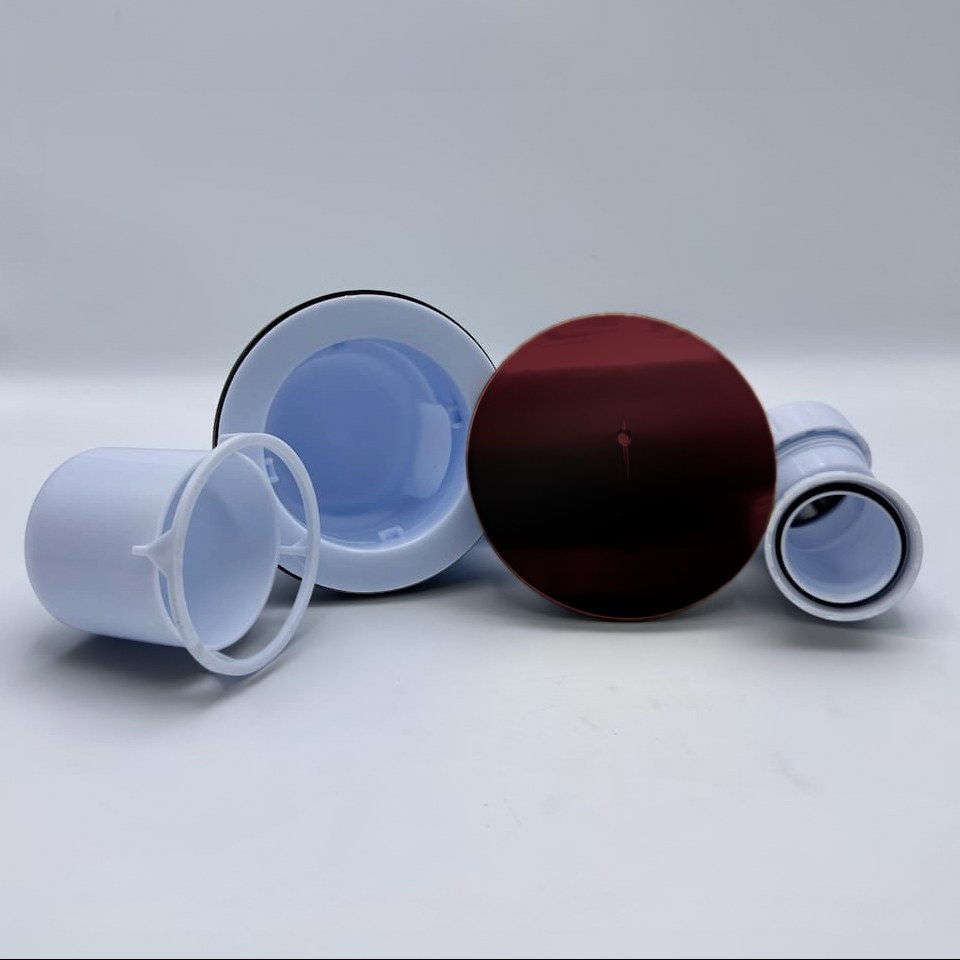 Omnitone shower waste in RAL 3005 Wine Red
